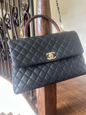 CHANEL Black Quilted Top-Handle Satchel with Gold Hardware and Burgundy Handle